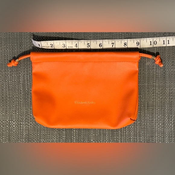 Elizabeth Arden Handbags - New Elizabeth Arden Orange Faux Leather Drawstring Cosmetic Pouch MAKEUP BAG